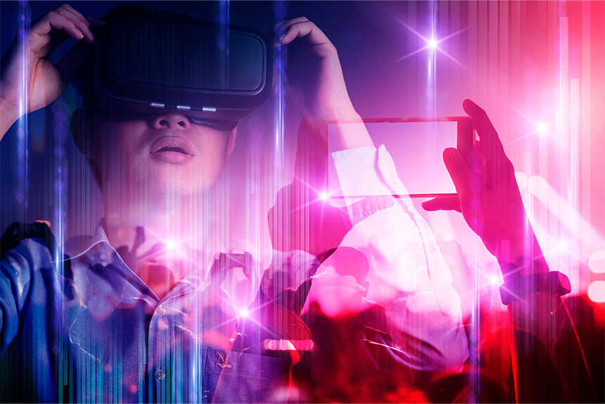 Young Asian man experiencing a live virtual reality concert, with hand extended as if interacting with immersive VR visuals and lighting effects.