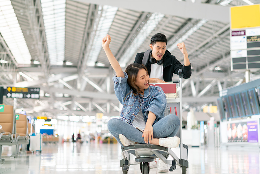 Young man and woman at the airport.