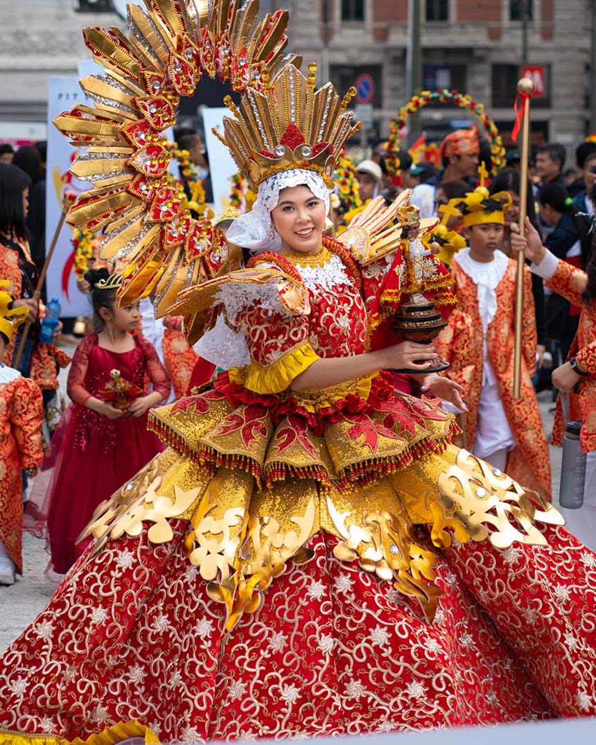 A Sinulog Festival performer in a colorful costume.