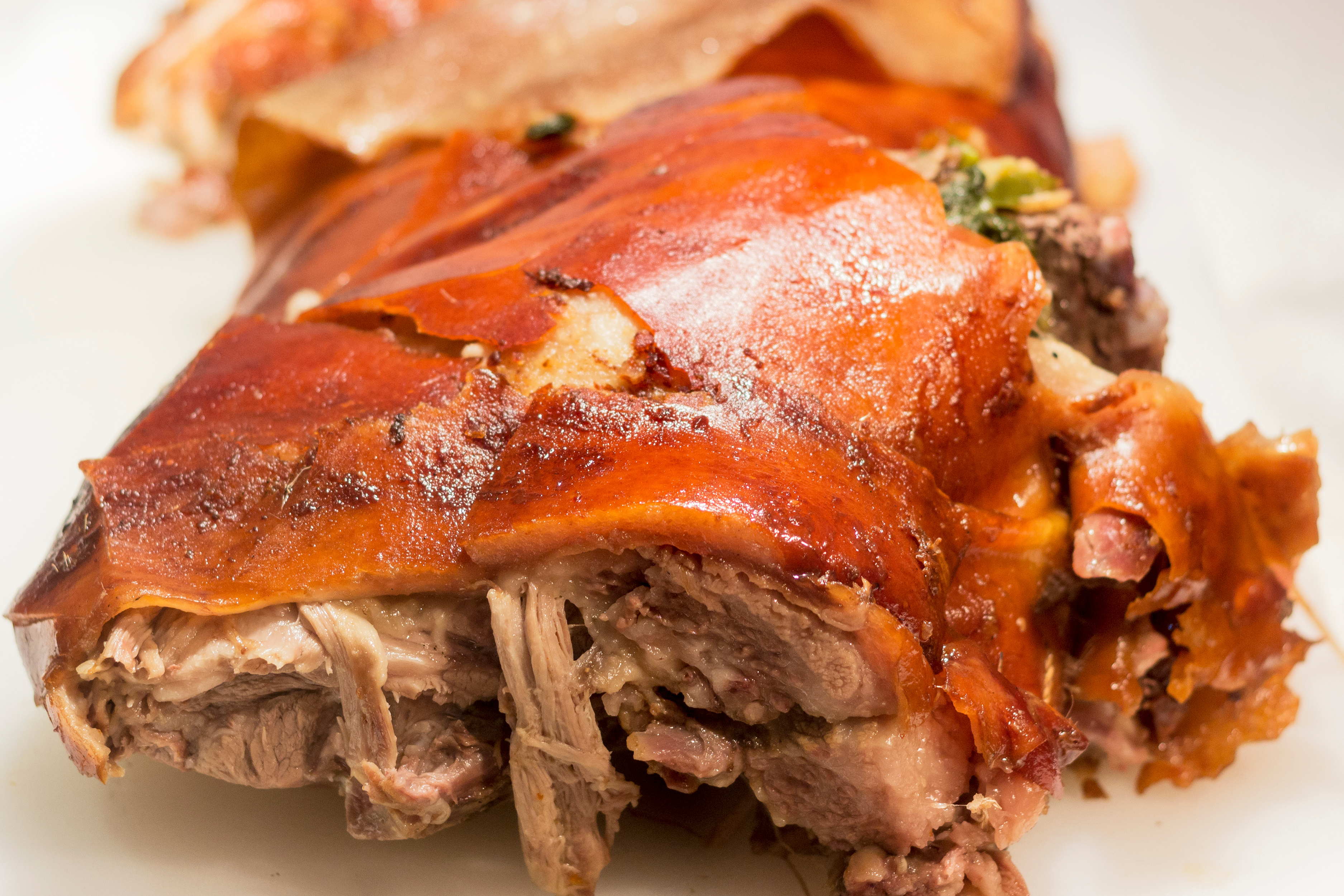Crispy skin and tender meat of roasted pig or lechon