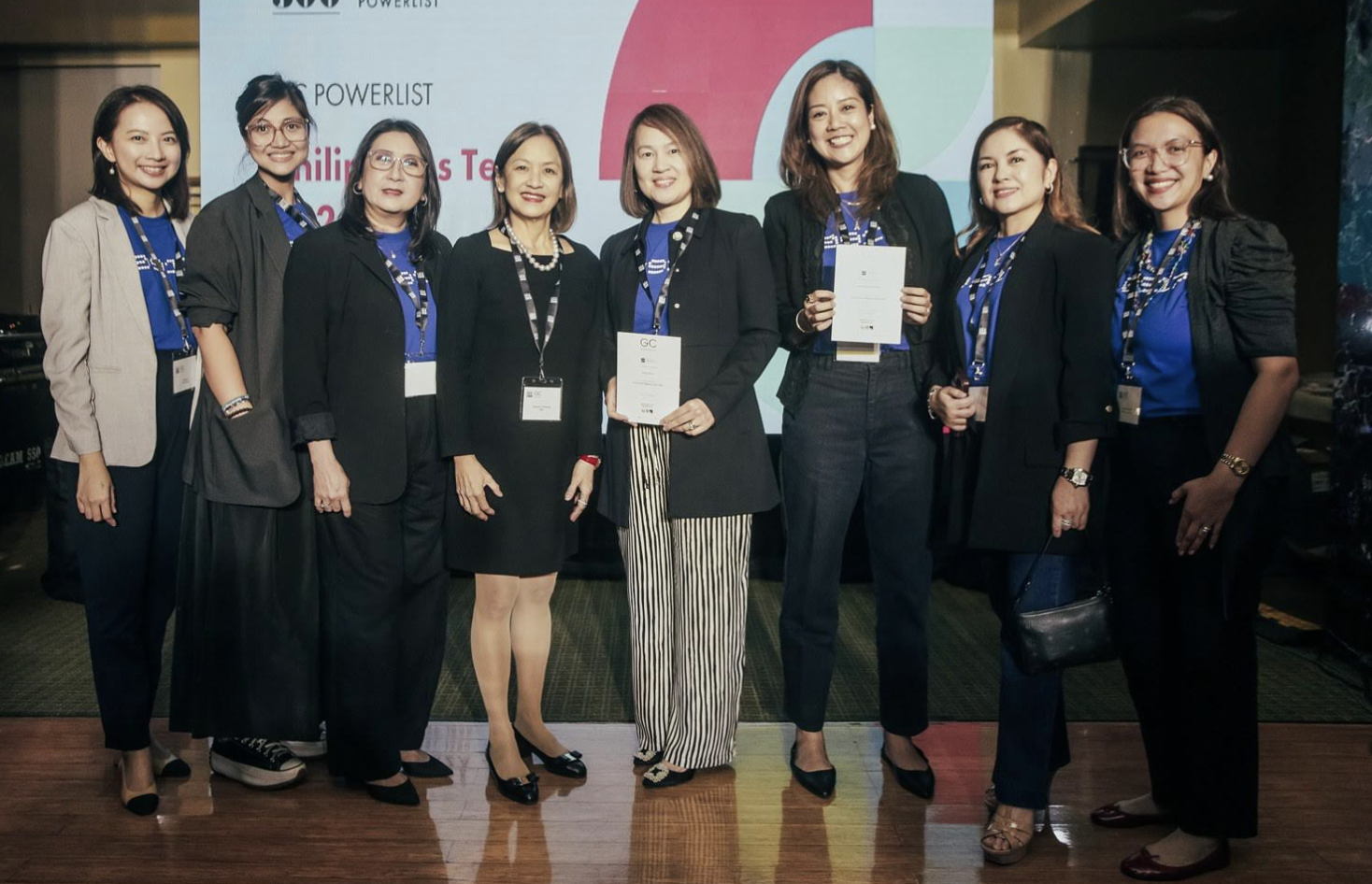 Atty. Ciocson-Co and other Globe lawyers accept the certificate of recognition for Globe.